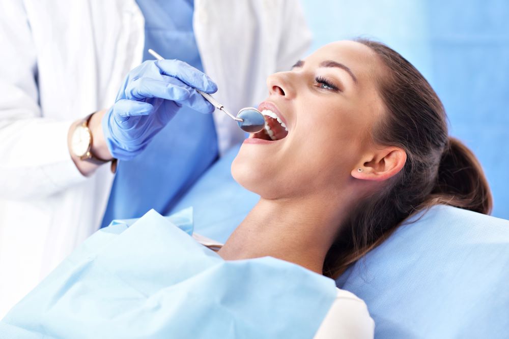 Woman Is Undergoing Dental Treatment